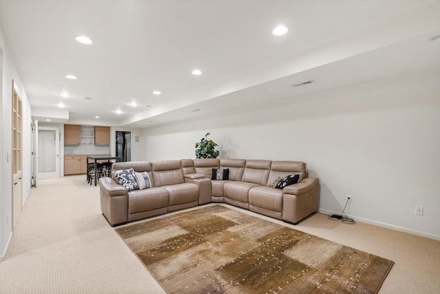 5555 70th St, Edina, MN 55439 - living room featuring light carpet, recessed lighting, and baseboards
