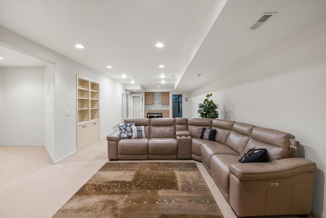 5555 70th St, Edina, MN 55439 - living room featuring recessed lighting, light colored carpet, a fireplace, baseboards, and built in features