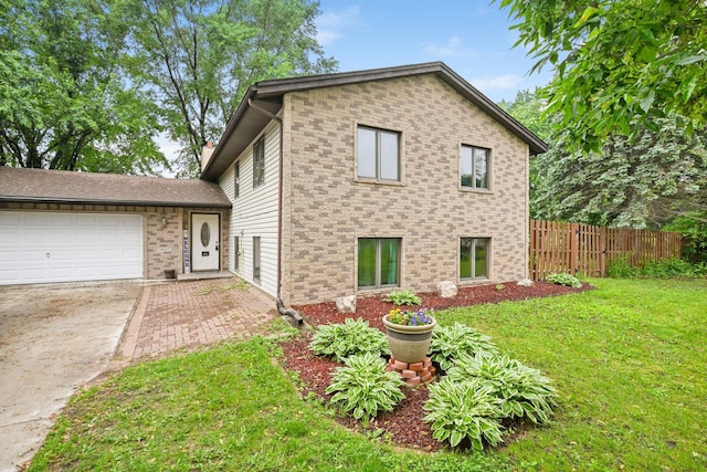 15607 93rd Cir NE, Otsego, MN 55330 - view of side of home with driveway, a garage, and brick siding