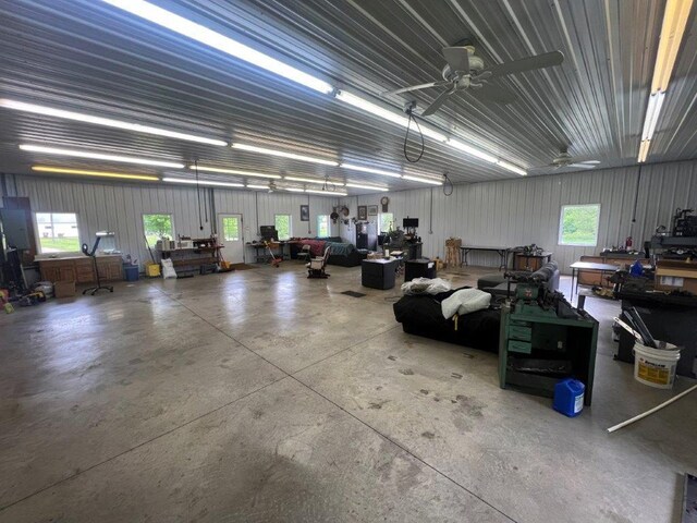 4365 40th St SW, Marysville Twp, MN 55390 - garage with a workshop area and a ceiling fan