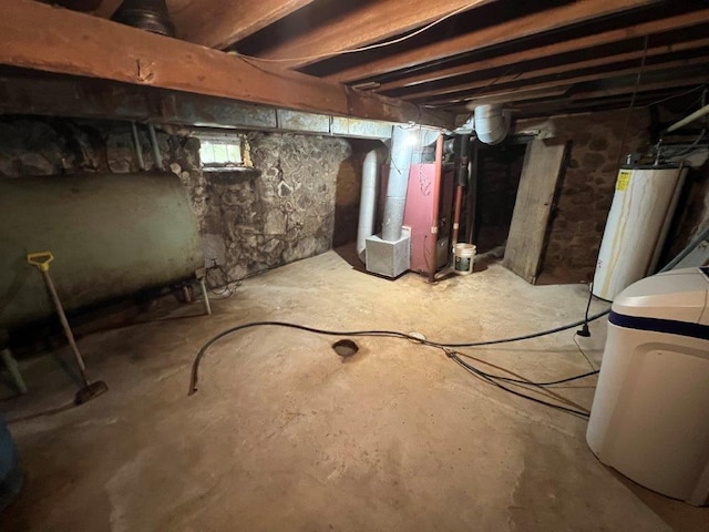 4365 40th St SW, Marysville Twp, MN 55390 - below grade area featuring water heater, oil tank, a water softener system, and heating unit