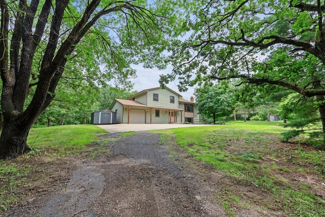 24345 165th St NW, Orrock Twp, MN 55309 - split level home with a storage shed, dirt driveway, a garage, a front lawn, and a chimney