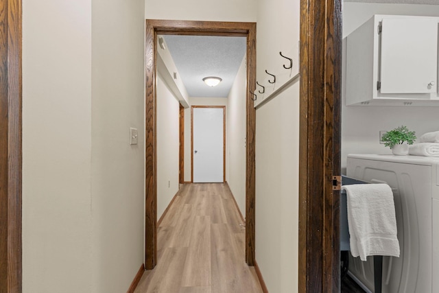 24345 165th St NW, Orrock Twp, MN 55309 - hallway featuring light wood-style floors and a textured ceiling