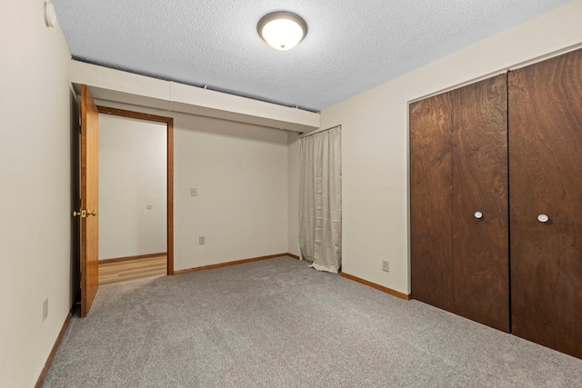 24345 165th St NW, Orrock Twp, MN 55309 - unfurnished bedroom featuring carpet and a textured ceiling