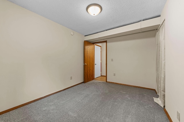 24345 165th St NW, Orrock Twp, MN 55309 - unfurnished room featuring carpet floors and a textured ceiling