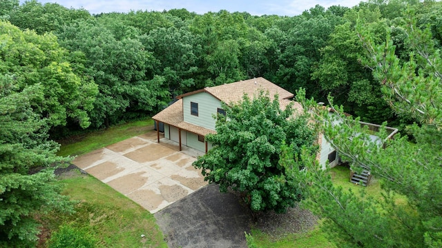24345 165th St NW, Orrock Twp, MN 55309 - aerial view of property and surrounding area featuring a heavily wooded area