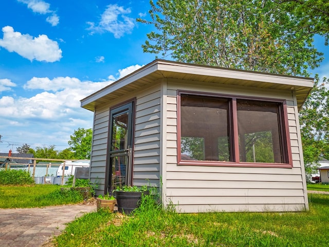 718 22nd St NW, Bemidji, MN 56601 - view of property exterior featuring an outdoor structure