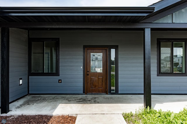 4712 Hampton Loop S, Moorhead, MN 56560 - doorway to property with covered porch