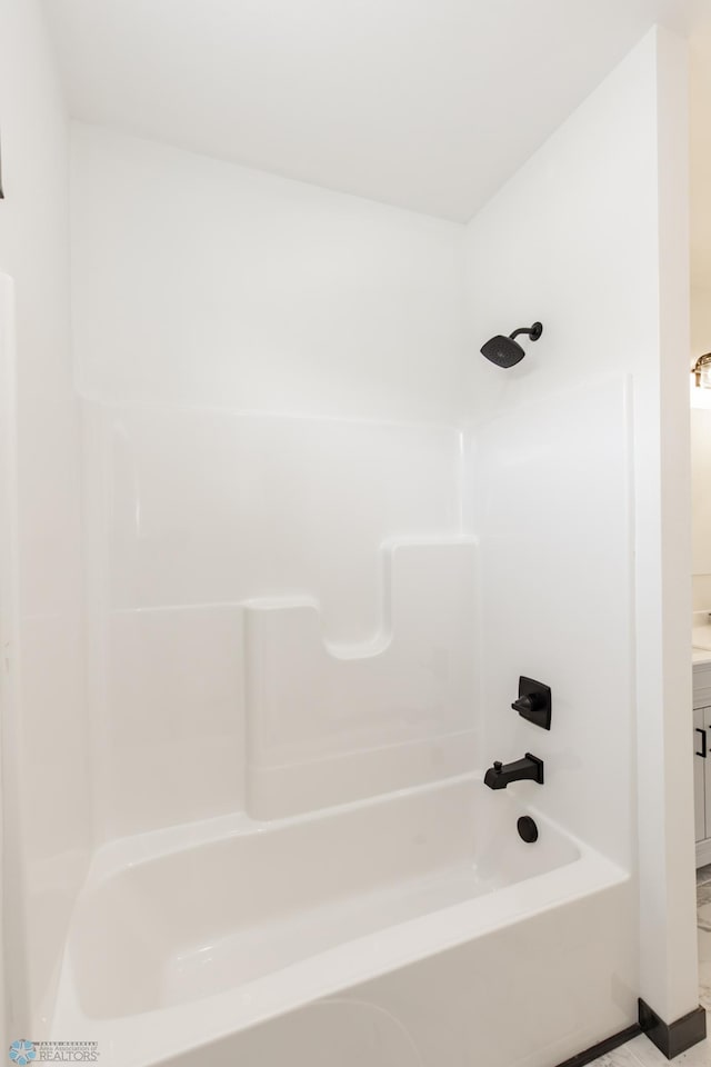 4712 Hampton Loop S, Moorhead, MN 56560 - bathroom featuring vanity and shower / bathtub combination