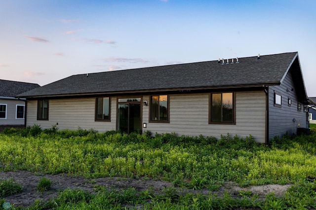 4712 Hampton Loop S, Moorhead, MN 56560 - view of front of home with a shingled roof and cooling unit
