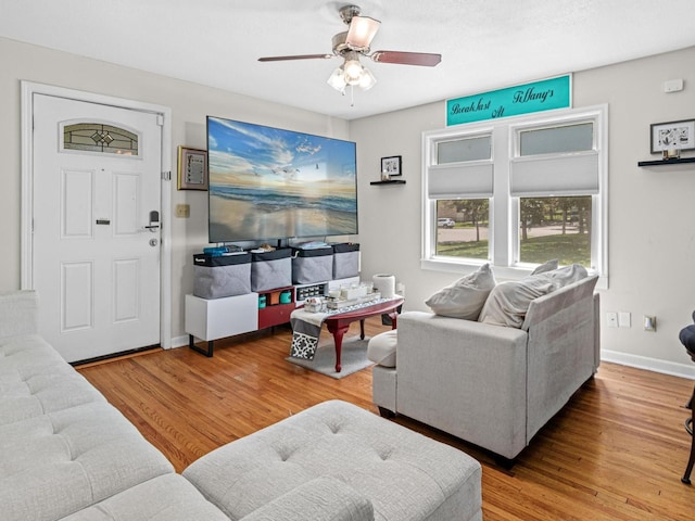 3944 Clinton Ave, Minneapolis, MN 55409 - living room with a ceiling fan and wood finished floors