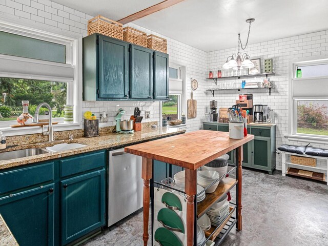 3944 Clinton Ave, Minneapolis, MN 55409 - kitchen featuring dishwasher, healthy amount of natural light, a chandelier, and hanging light fixtures