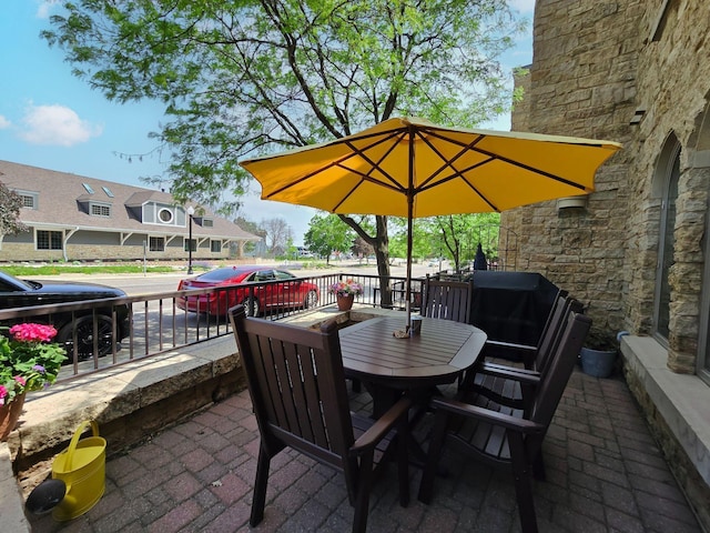 650 Main St N Unit B05, Stillwater, MN 55082 - view of patio / terrace featuring outdoor dining area