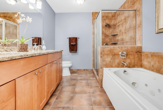 650 Main St N Unit B05, Stillwater, MN 55082 - bathroom featuring vanity, a stall shower, a whirlpool tub, toilet, and tile patterned flooring