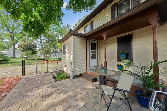 721 1st St N, Waterville, MN 56096 - view of patio featuring a gate