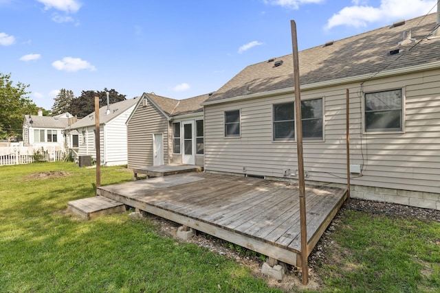 5107 Corvallis Ave N, Crystal, MN 55429 - back of property featuring a wooden deck and roof with shingles