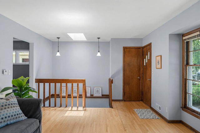 5625 Upton Ave S, Minneapolis, MN 55410 - entrance foyer featuring a skylight and light wood-style floors