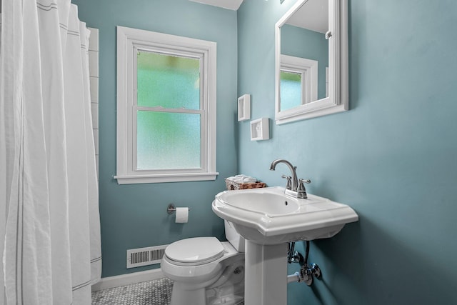 5625 Upton Ave S, Minneapolis, MN 55410 - bathroom featuring plenty of natural light and curtained shower