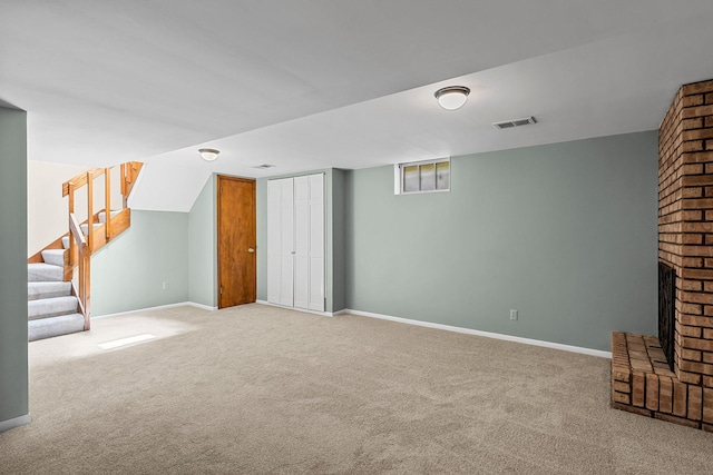 5625 Upton Ave S, Minneapolis, MN 55410 - unfurnished living room featuring carpet floors, stairs, and a fireplace