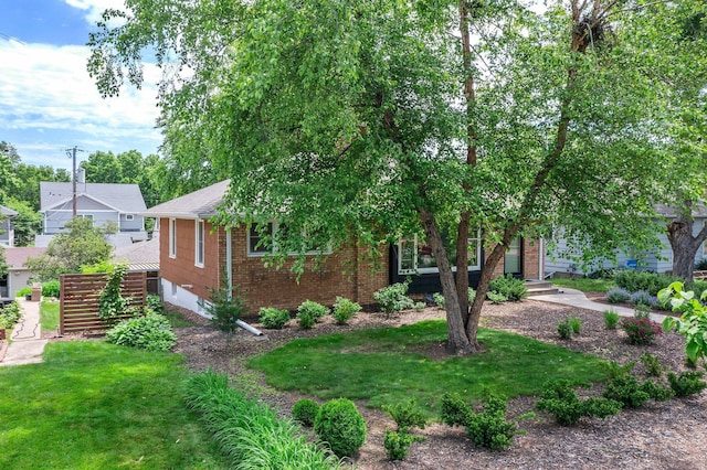 5625 Upton Ave S, Minneapolis, MN 55410 - view of front of home featuring brick siding and a front yard