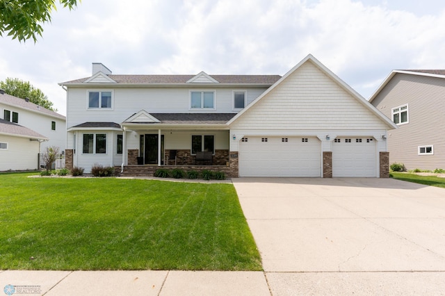 4408 Riverwood Dr N, Fargo, ND 58102 - view of front of home with covered porch, an attached garage, concrete driveway, and a front yard
