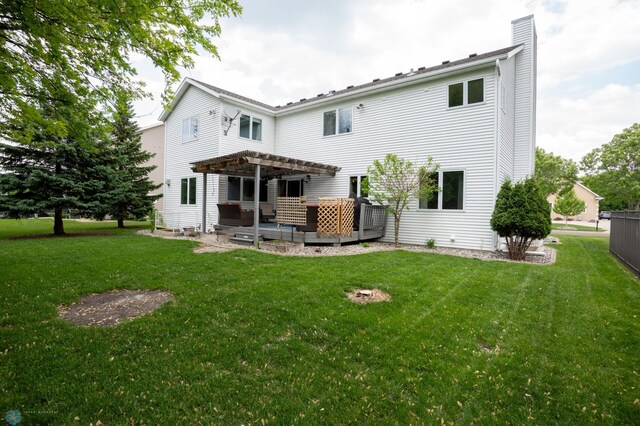 4408 Riverwood Dr N, Fargo, ND 58102 - back of property with a pergola, a chimney, a lawn, and an outdoor hangout area