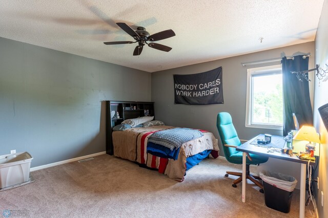 4408 Riverwood Dr N, Fargo, ND 58102 - carpeted bedroom featuring a textured ceiling, ceiling fan, and an office area