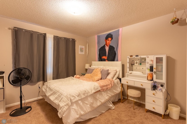4408 Riverwood Dr N, Fargo, ND 58102 - carpeted bedroom featuring a textured ceiling
