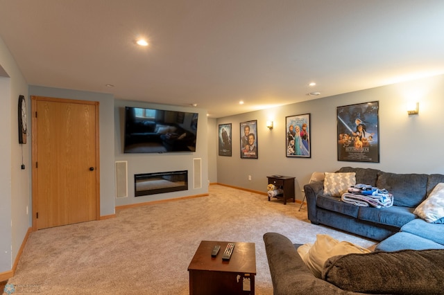 4408 Riverwood Dr N, Fargo, ND 58102 - living area with carpet flooring, baseboards, recessed lighting, and a glass covered fireplace