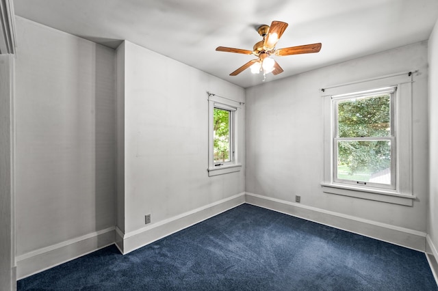 2059 Iglehart Ave, Saint Paul, MN 55104 - empty room featuring dark carpet, ceiling fan, and baseboards