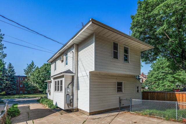 2059 Iglehart Ave, Saint Paul, MN 55104 - view of property exterior with a patio area