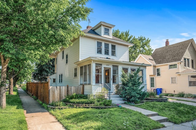 2059 Iglehart Ave, Saint Paul, MN 55104 - traditional style home featuring a sunroom