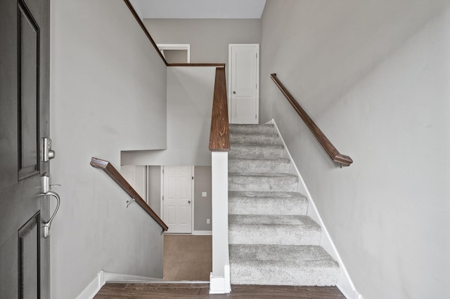 5040 93rd Ln N, Brooklyn Park, MN 55443 - staircase featuring wood finished floors and baseboards