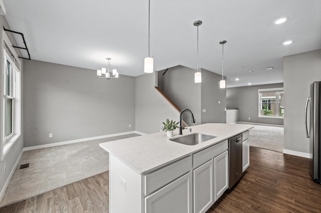 5040 93rd Ln N, Brooklyn Park, MN 55443 - kitchen featuring open floor plan, a sink, stainless steel appliances, baseboards, and recessed lighting