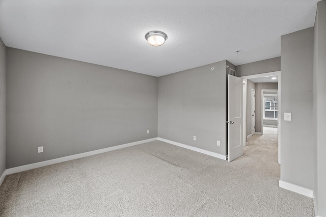 5040 93rd Ln N, Brooklyn Park, MN 55443 - unfurnished room with light carpet and baseboards