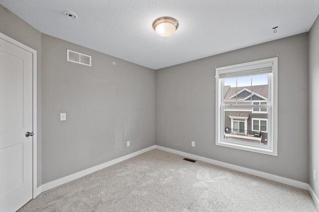 5040 93rd Ln N, Brooklyn Park, MN 55443 - carpeted spare room featuring baseboards