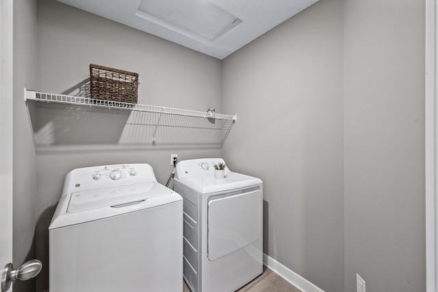 5040 93rd Ln N, Brooklyn Park, MN 55443 - laundry room featuring washing machine and clothes dryer, attic access, and baseboards