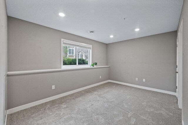 5040 93rd Ln N, Brooklyn Park, MN 55443 - carpeted spare room with recessed lighting and baseboards
