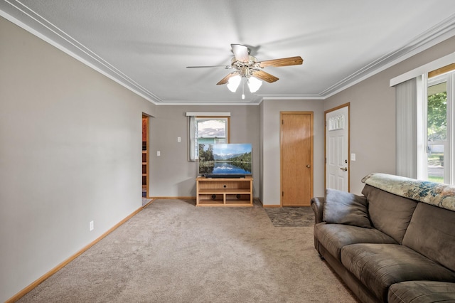 5030 Jefferson St NE, Columbia Heights, MN 55421 - living room featuring ceiling fan, ornamental molding, carpet floors, and baseboards