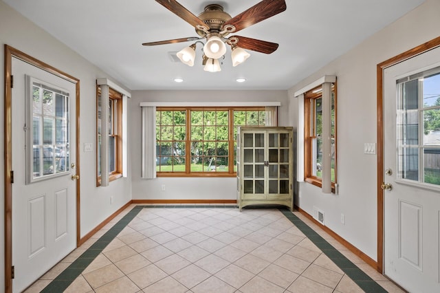 5030 Jefferson St NE, Columbia Heights, MN 55421 - entrance foyer featuring light tile patterned floors, baseboards, a ceiling fan, recessed lighting, and inlaid floor details