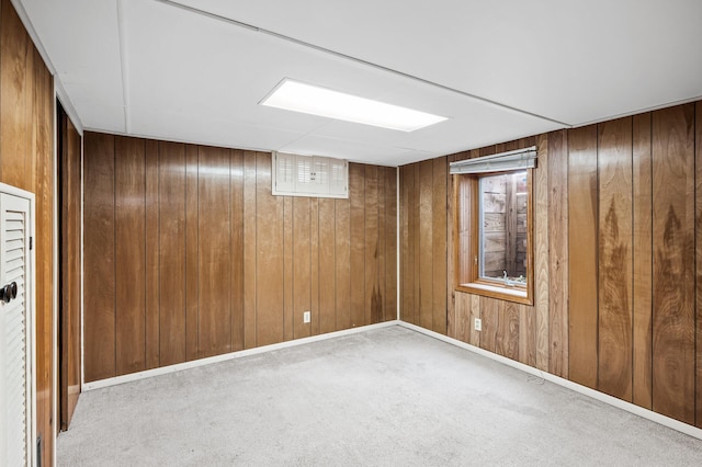5030 Jefferson St NE, Columbia Heights, MN 55421 - basement with carpet, wood walls, and baseboards
