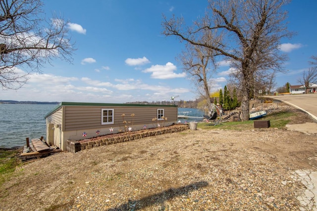 18023 Roberds Lake Blvd, Faribault, MN 55021 - view of property exterior featuring a water view