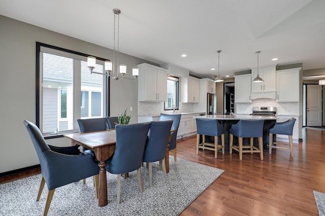 2524 Sandstone Ln, Orono, MN 55356 - dining area with recessed lighting, dark wood finished floors, and a chandelier