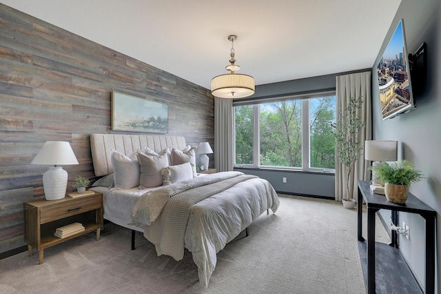 2524 Sandstone Ln, Orono, MN 55356 - bedroom featuring wood walls, carpet flooring, and baseboards