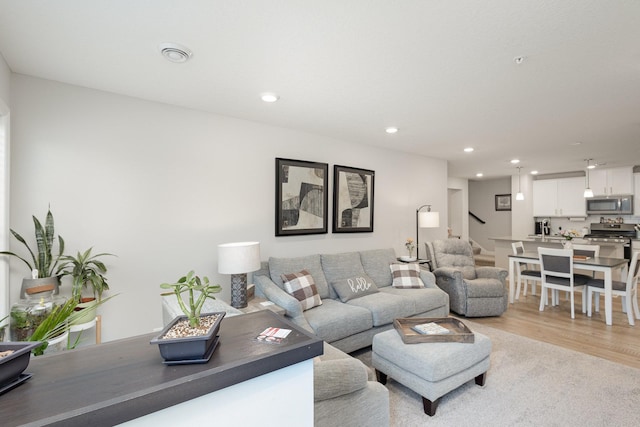 1212 Lower 143rd St E, Rosemount, MN 55068 - living room featuring recessed lighting, stairs, and light wood-style floors
