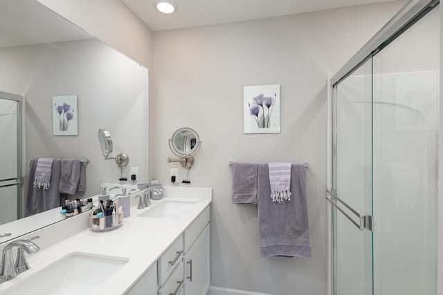 1212 Lower 143rd St E, Rosemount, MN 55068 - full bath featuring a shower stall, double vanity, and baseboards