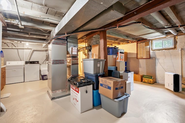 16957 Lake Netta Dr NE, Ham Lake, MN 55304 - basement featuring washing machine and dryer and heating unit