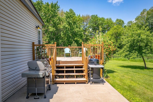 16957 Lake Netta Dr NE, Ham Lake, MN 55304 - deck with a lawn, area for grilling, and view of scattered trees