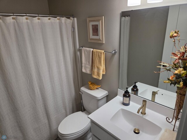 6746 Joseph St, Horace, ND 58047 - full bathroom featuring toilet, vanity, and curtained shower