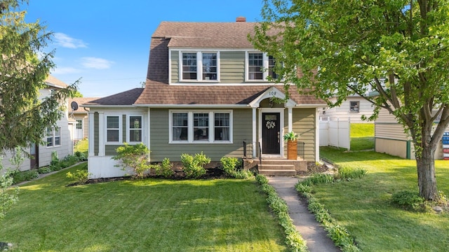 108 Roosevelt St, Coleraine, MN 55722 - dutch colonial with a shingled roof, a chimney, and a gambrel roof
